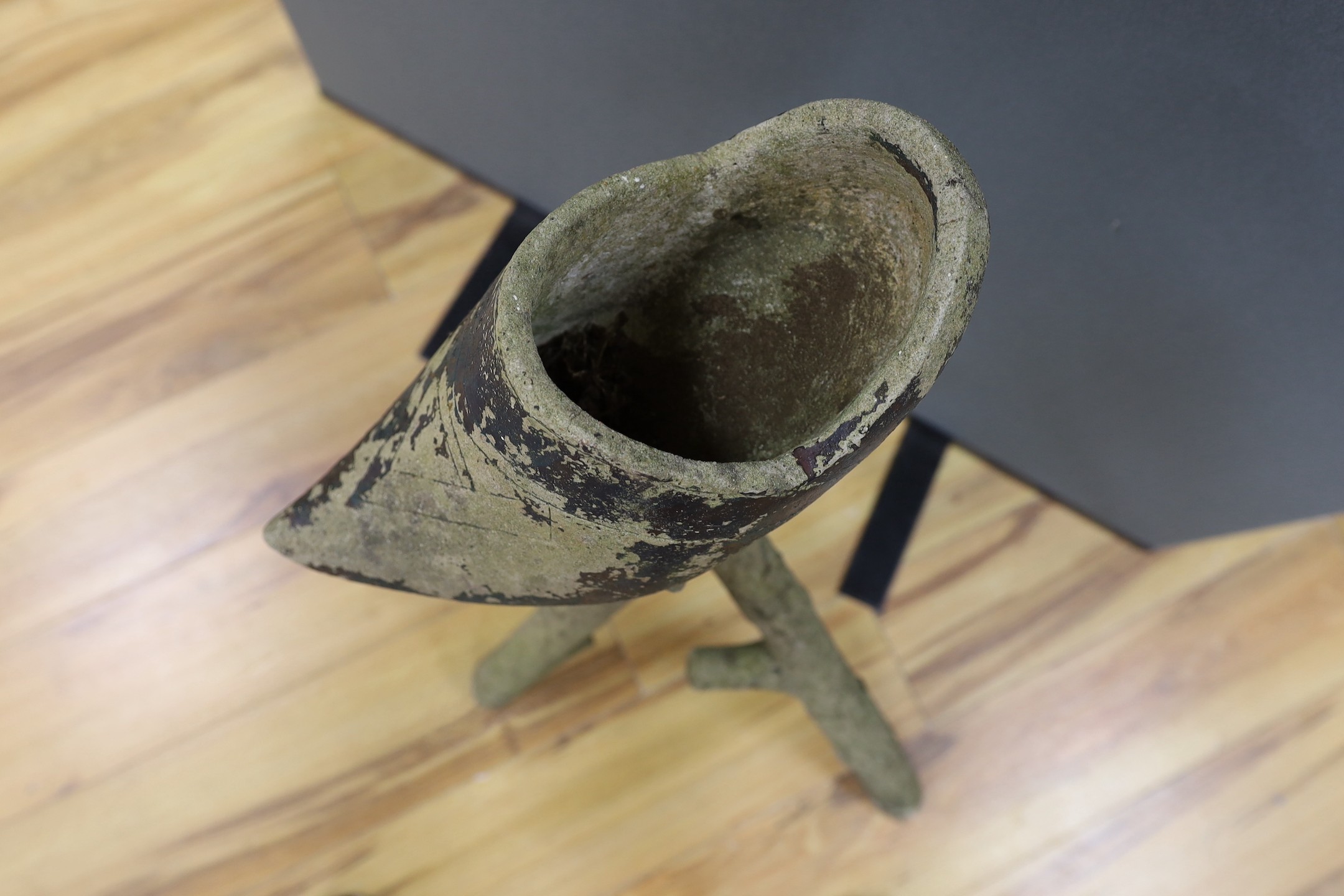 A reconstituted stone 'clog' jardiniere, 83cm